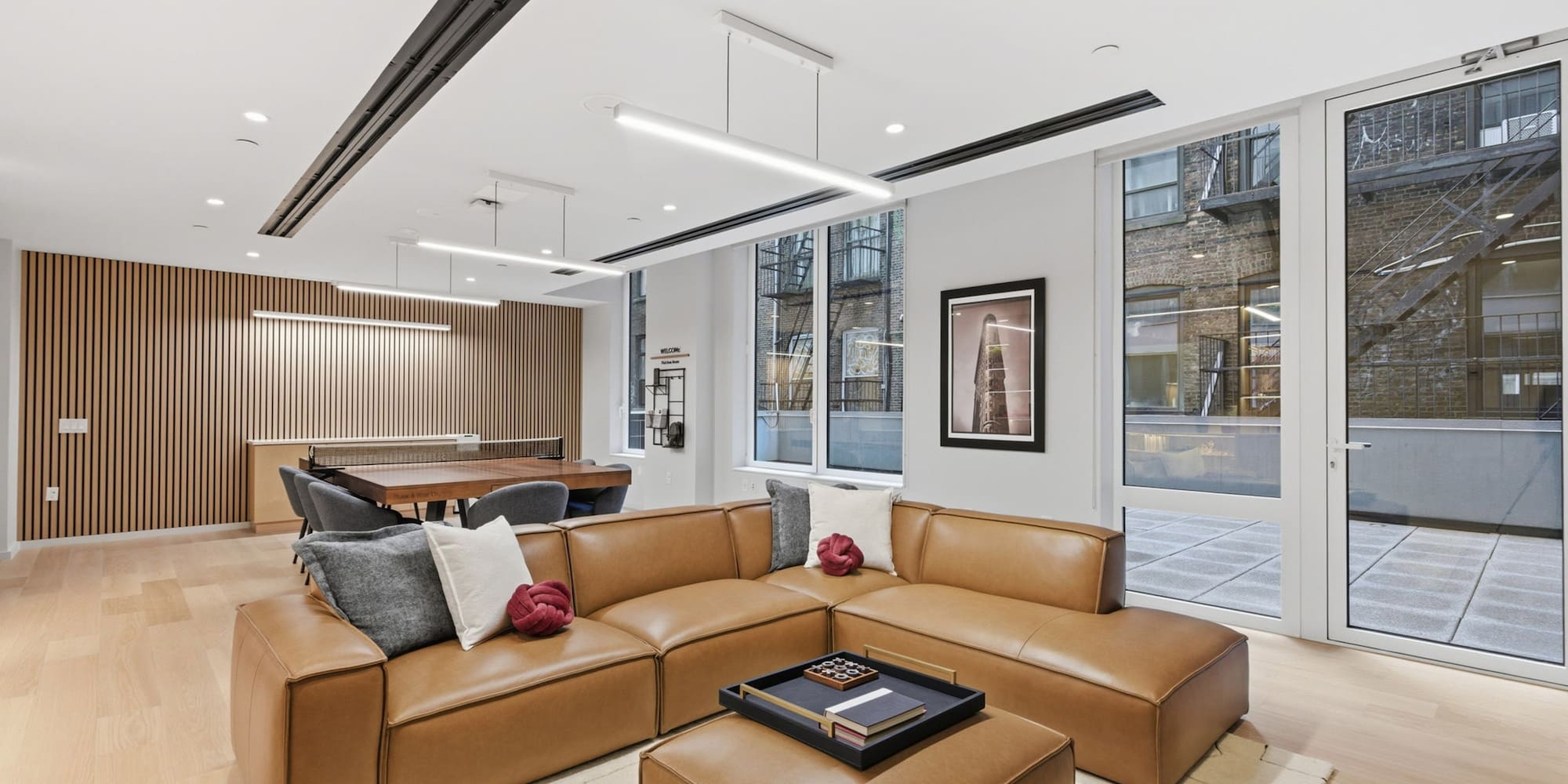 a living room with a large couch and a table