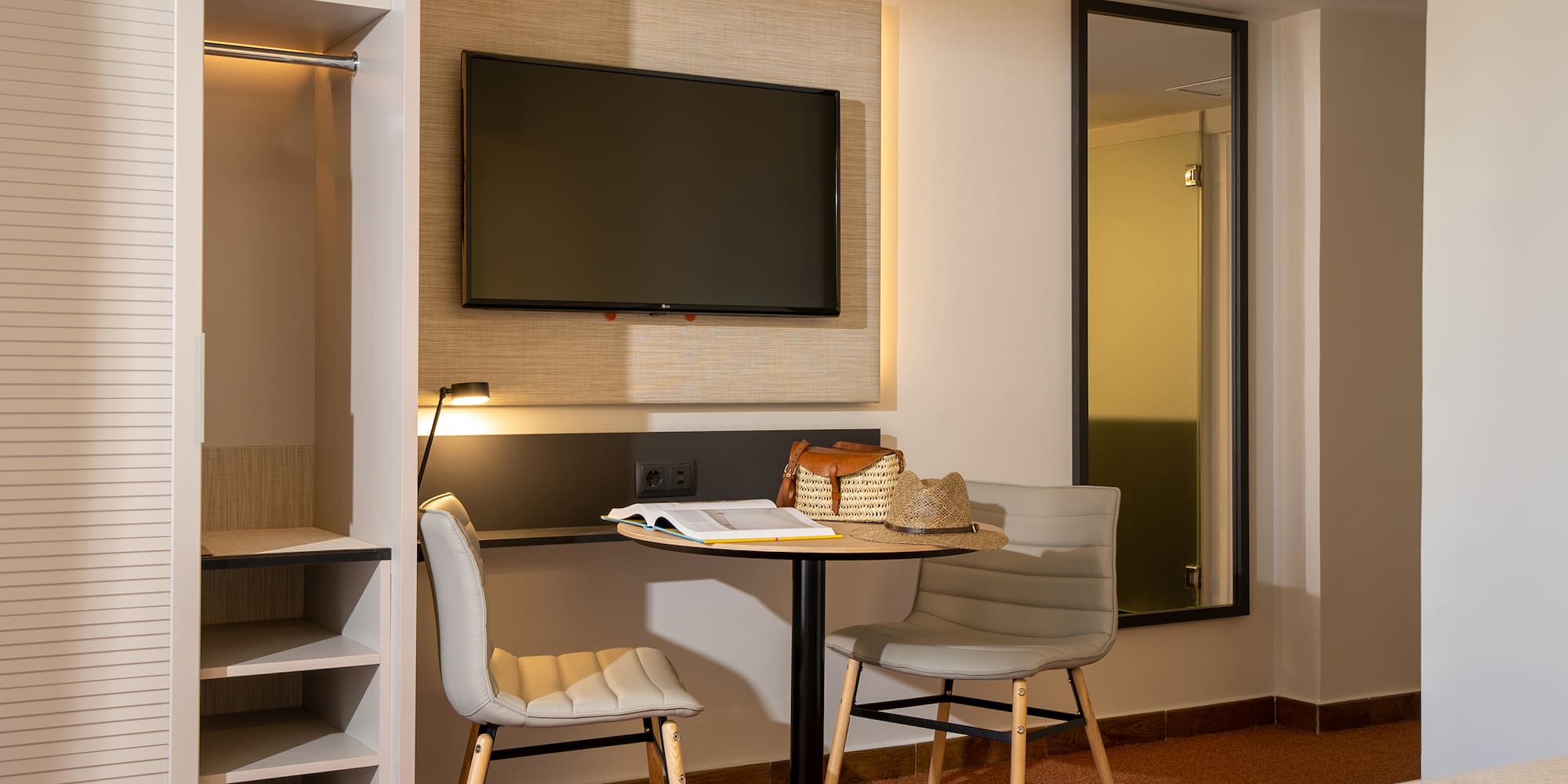 a room with a tv and a table