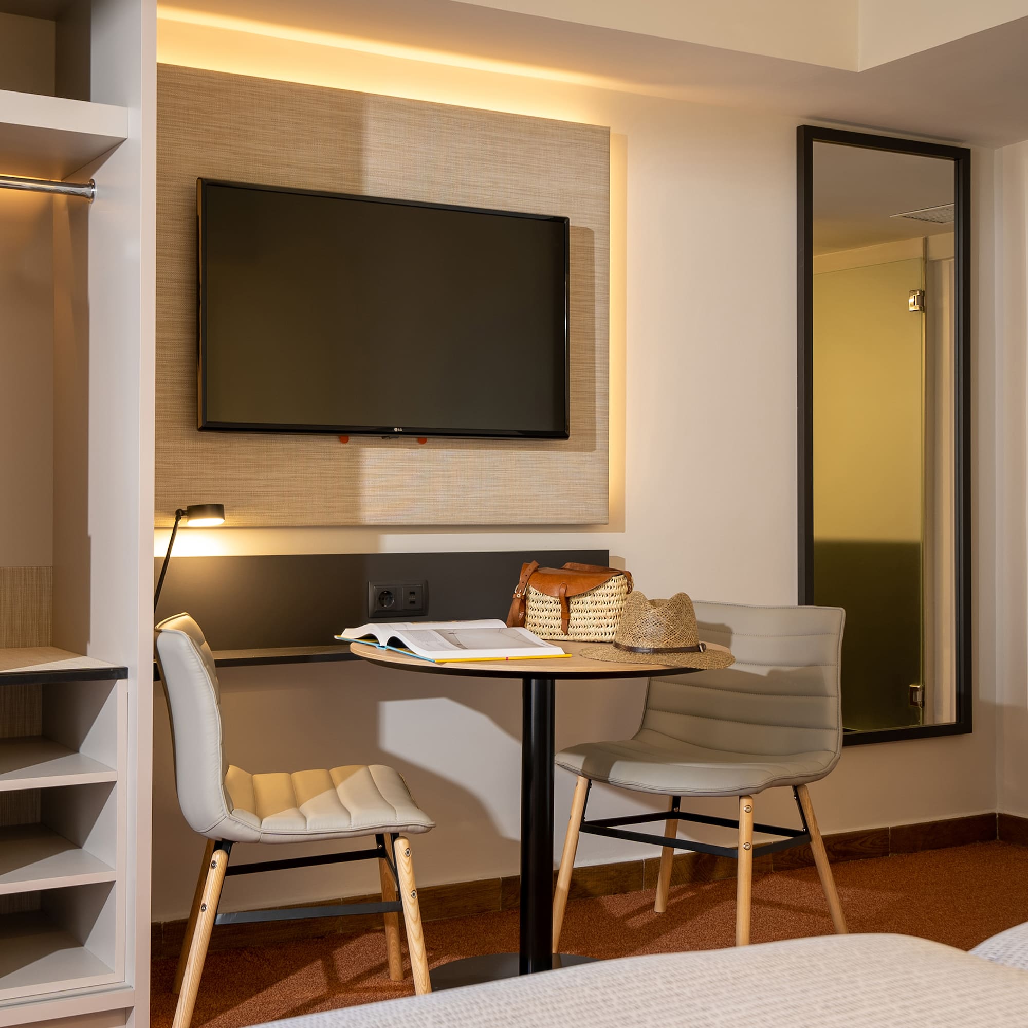 a room with a tv and a table