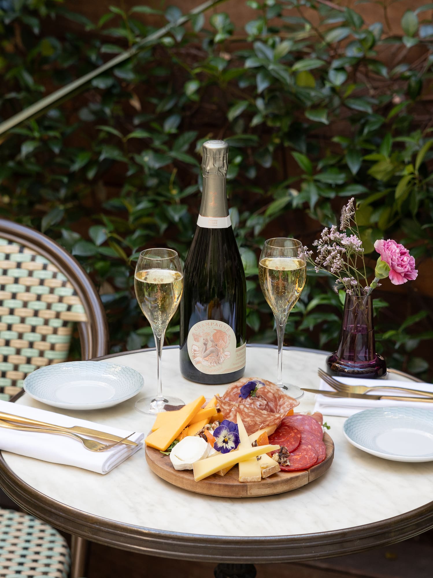 a table with food and wine on it