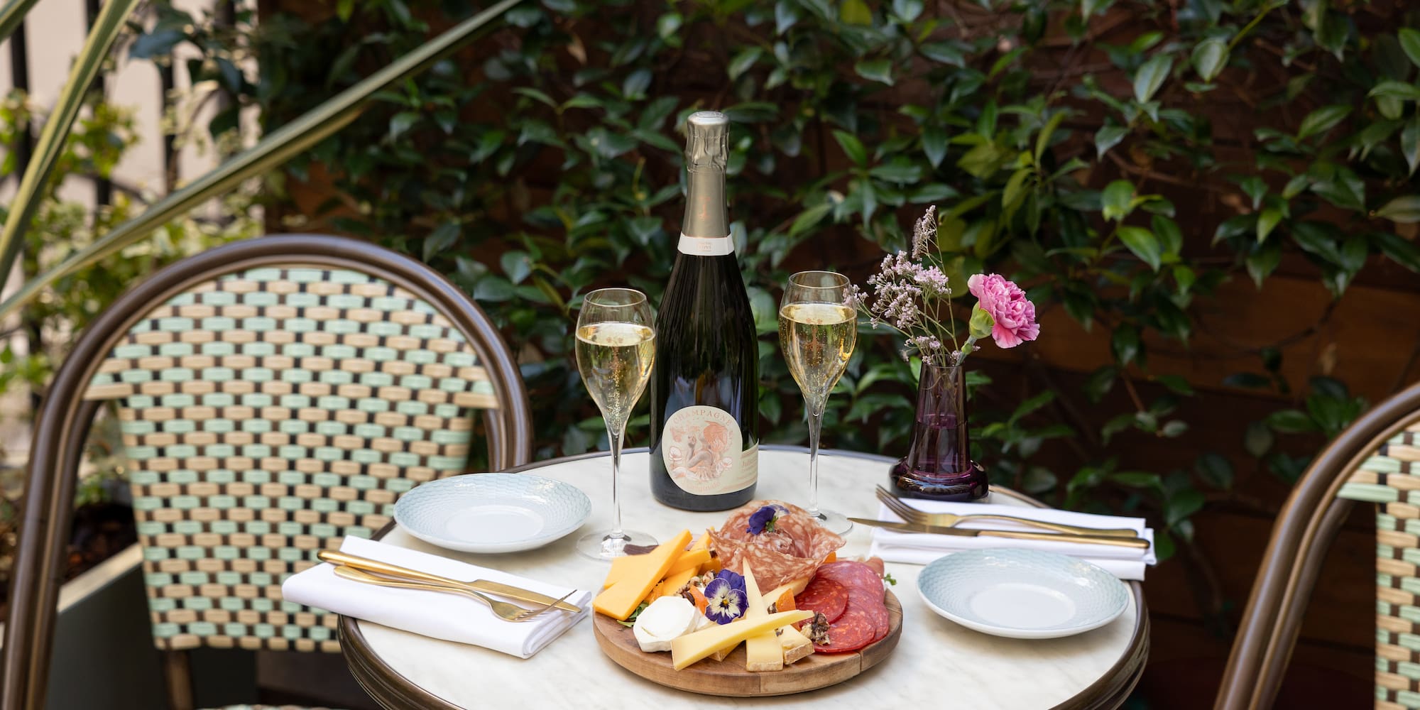 a table with food and wine on it