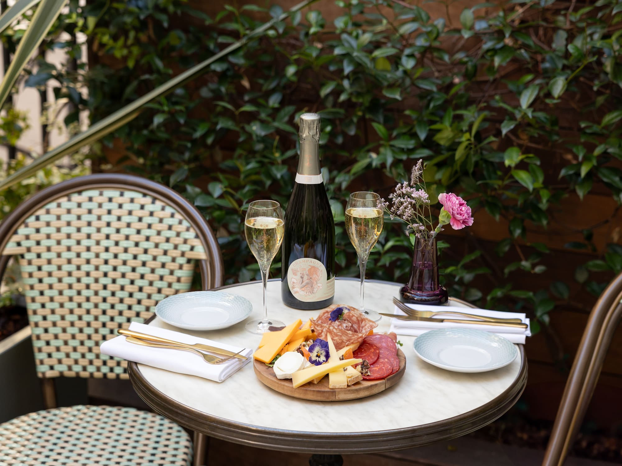 a table with food and wine on it