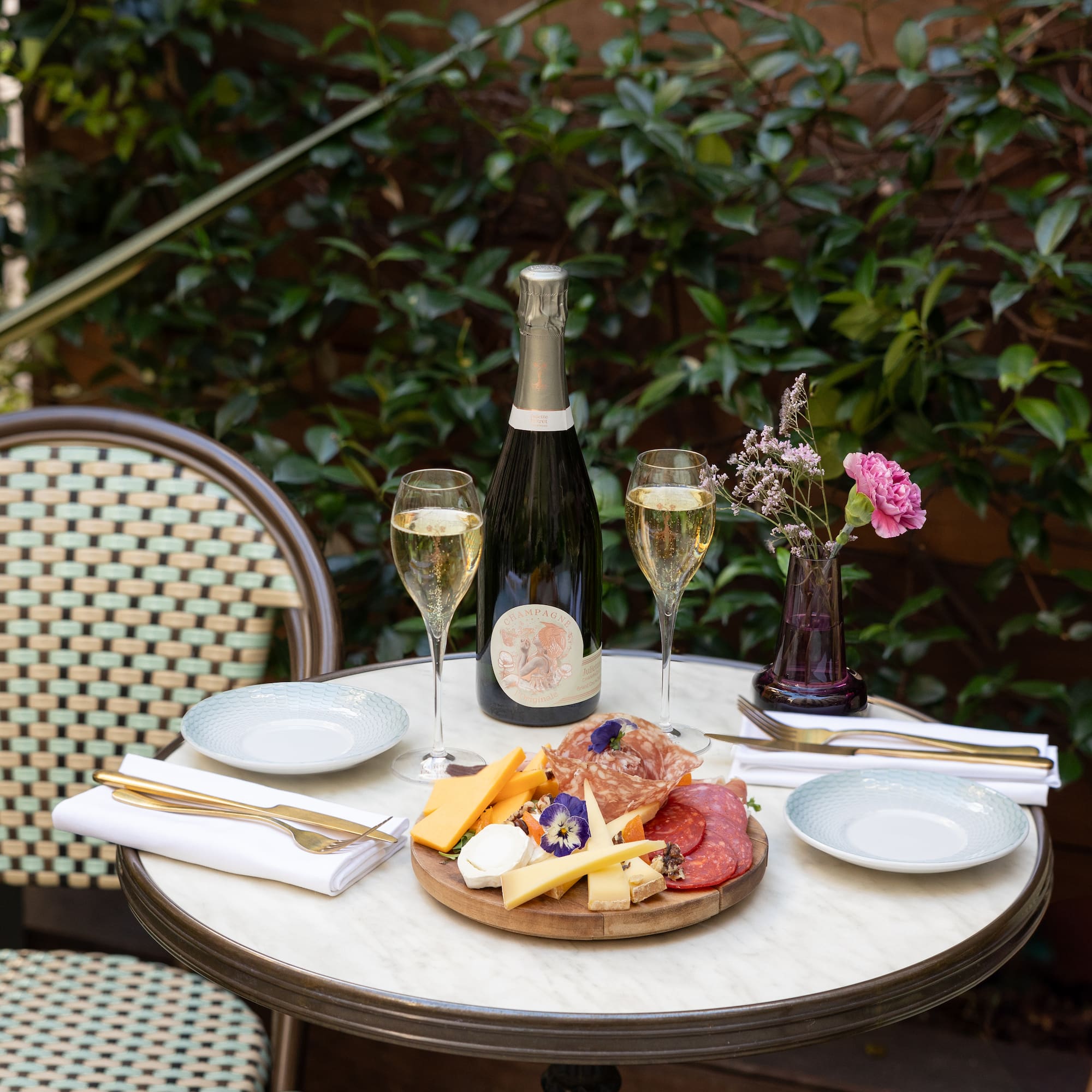 a table with food and wine on it
