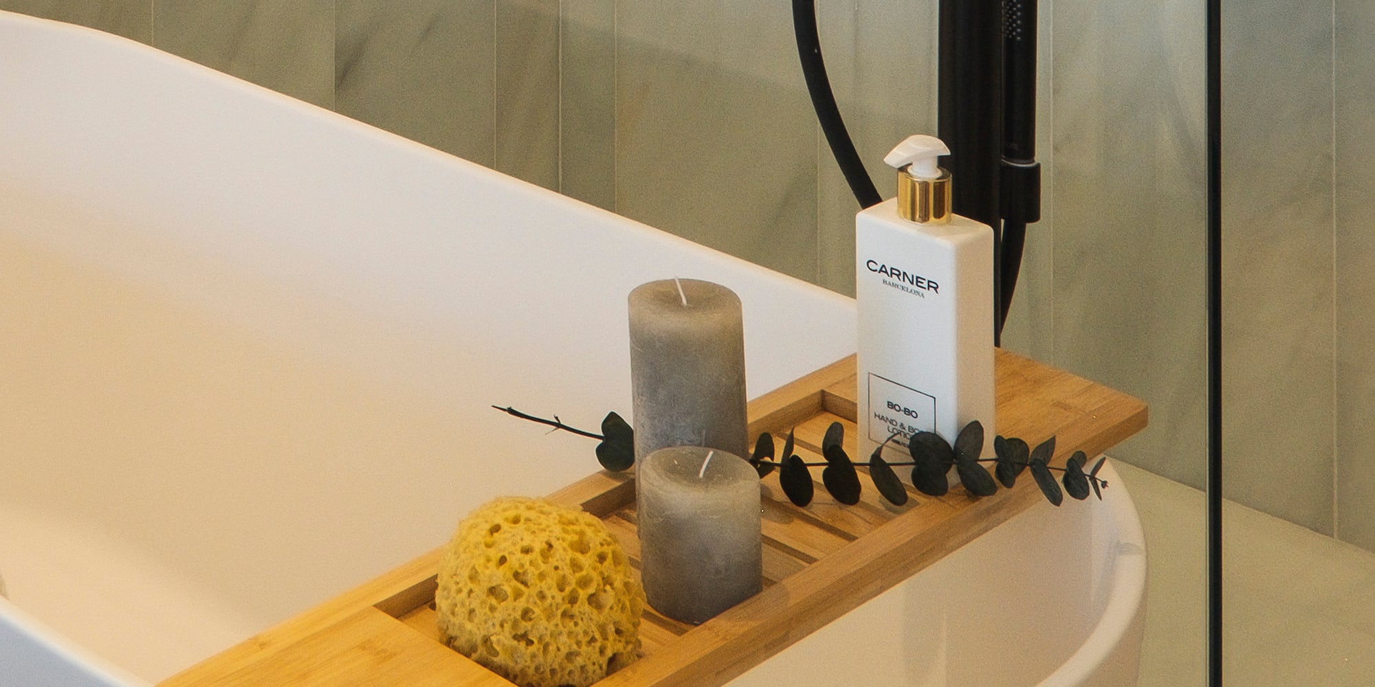 a shower with a bathtub and a shower head