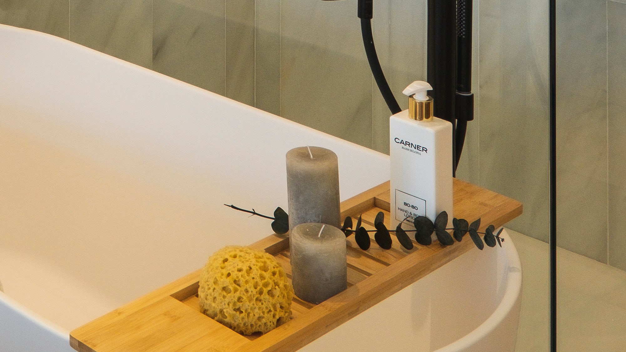 a shower with a bathtub and a shower head