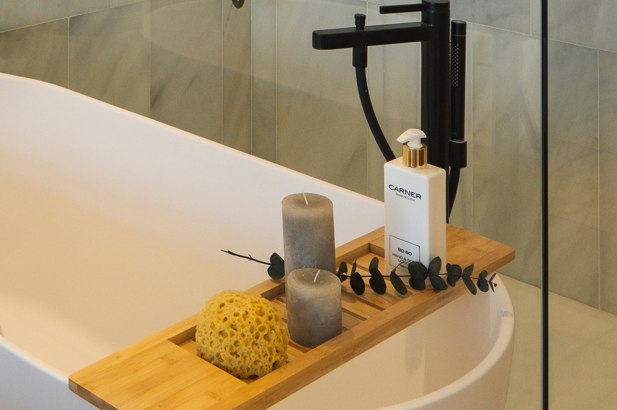 a shower with a bathtub and a shower head