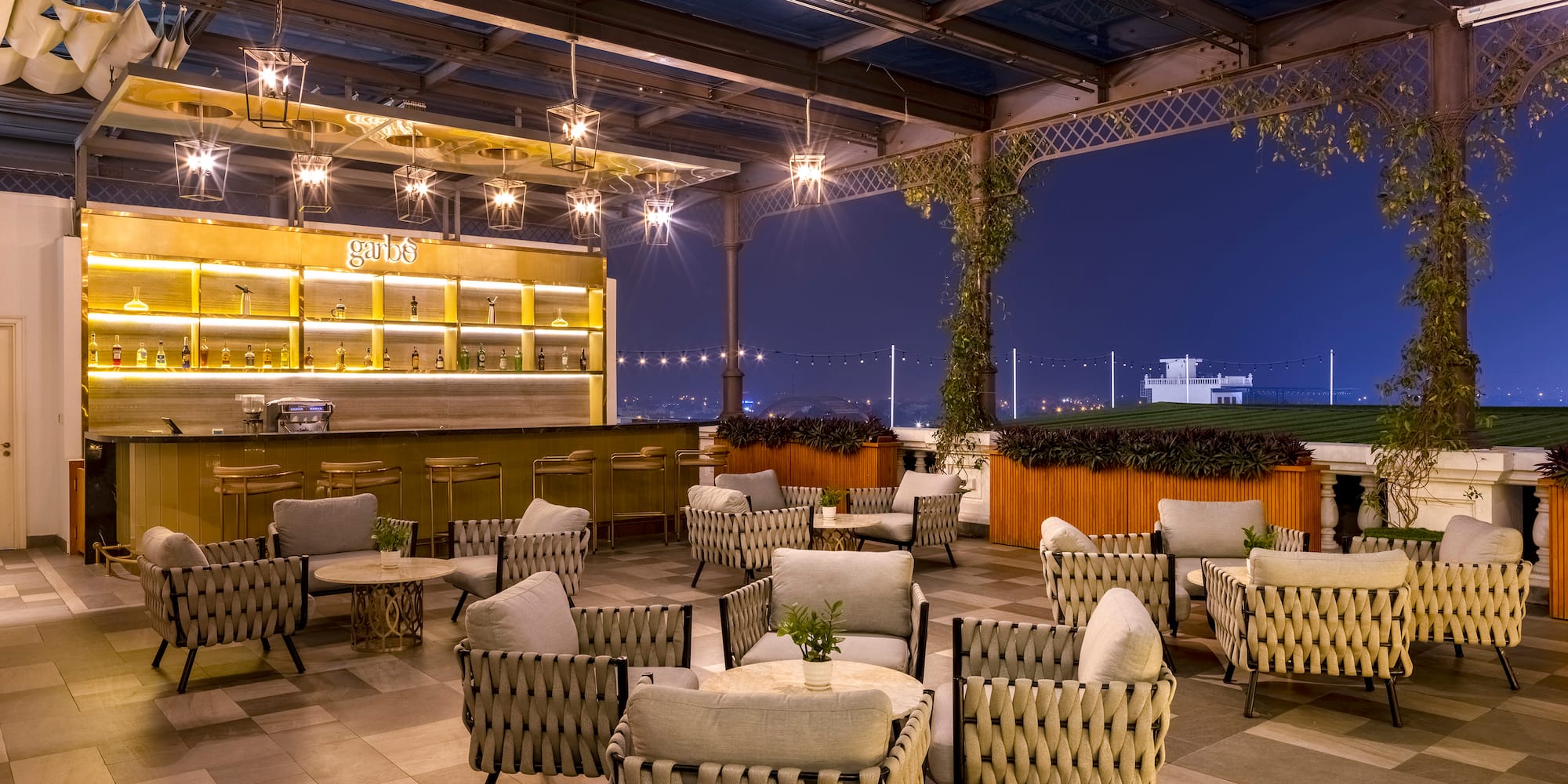 a patio with chairs and tables