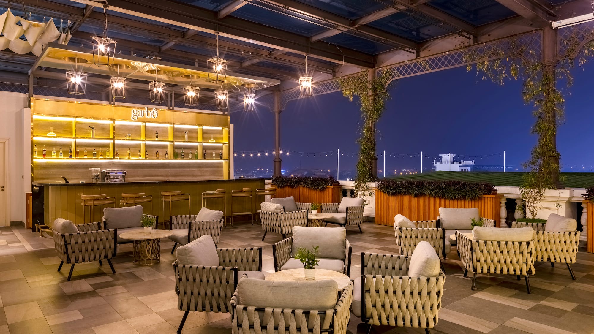 a patio with chairs and tables