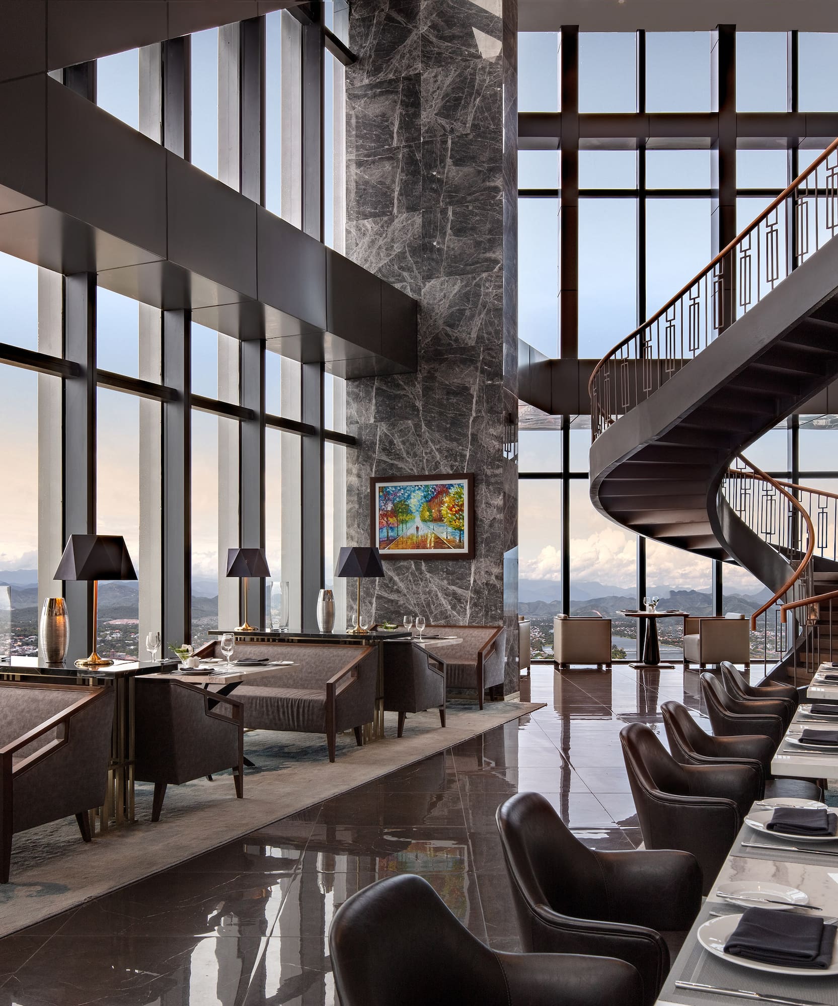 a restaurant with a spiral staircase