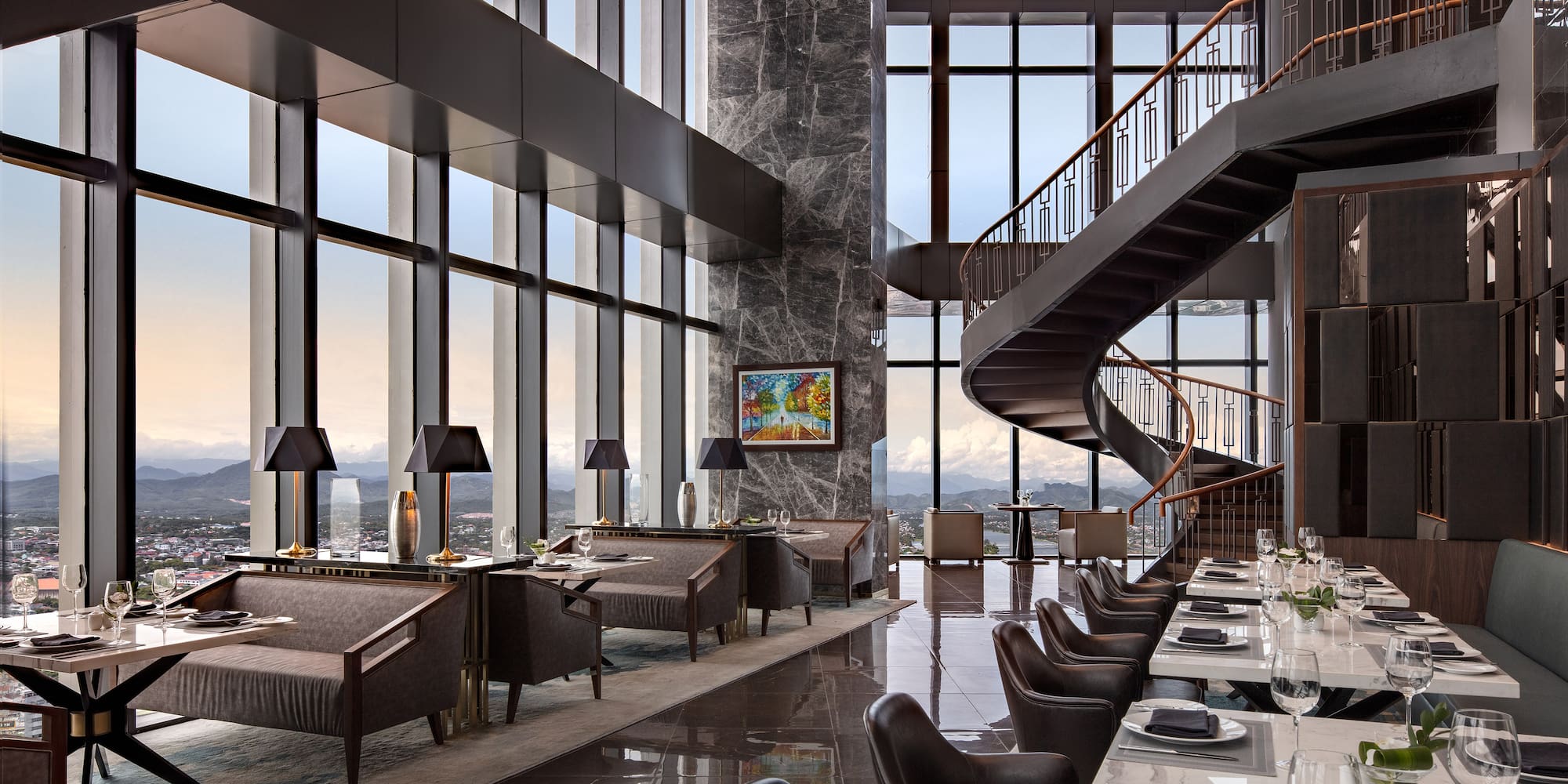 a restaurant with a spiral staircase