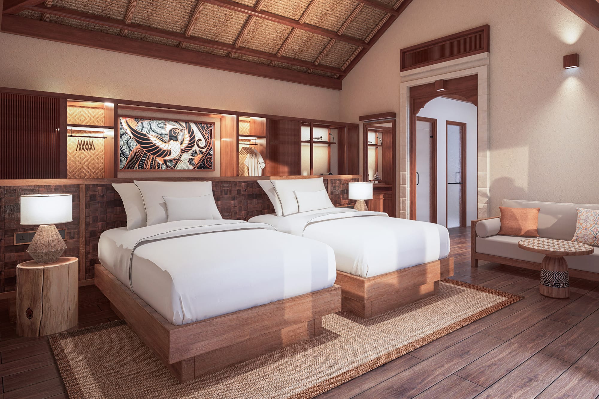 a room with two beds and a chair