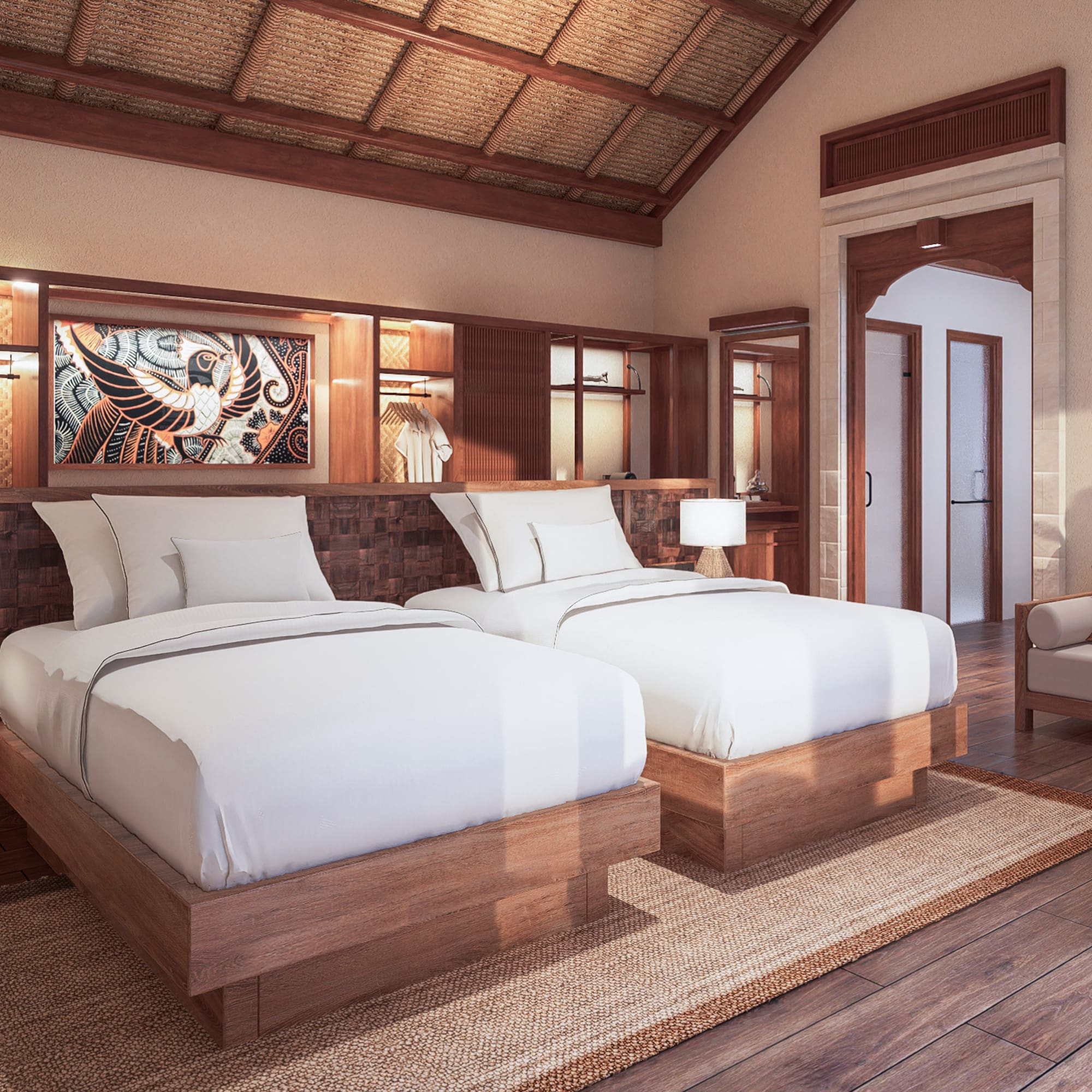 a room with two beds and a chair