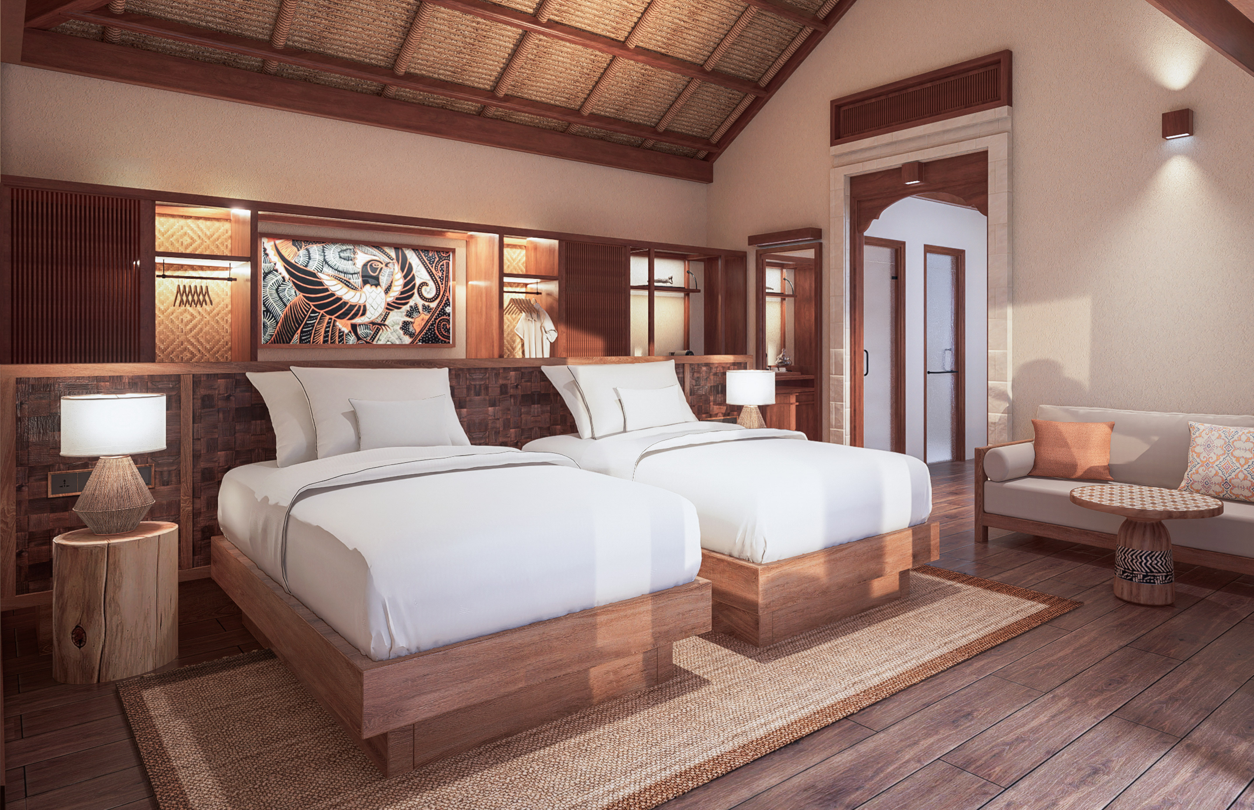 a room with two beds and a chair