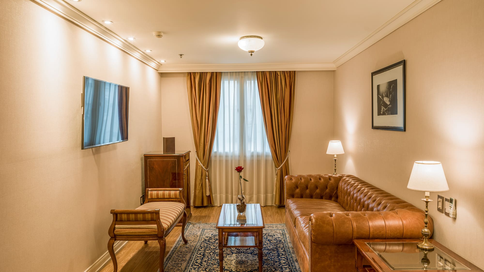 a living room with a couch and a table