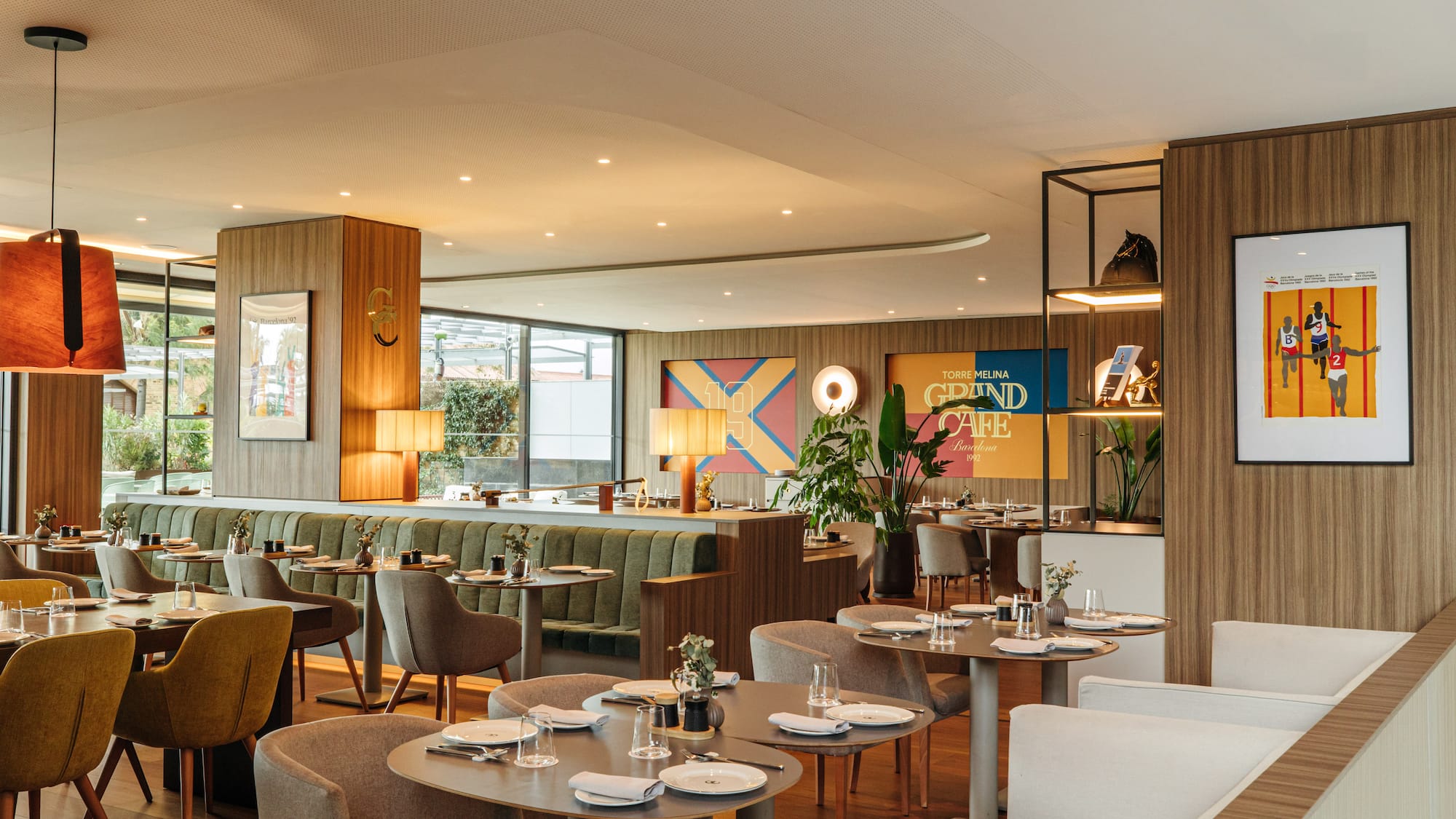 a restaurant with tables and chairs