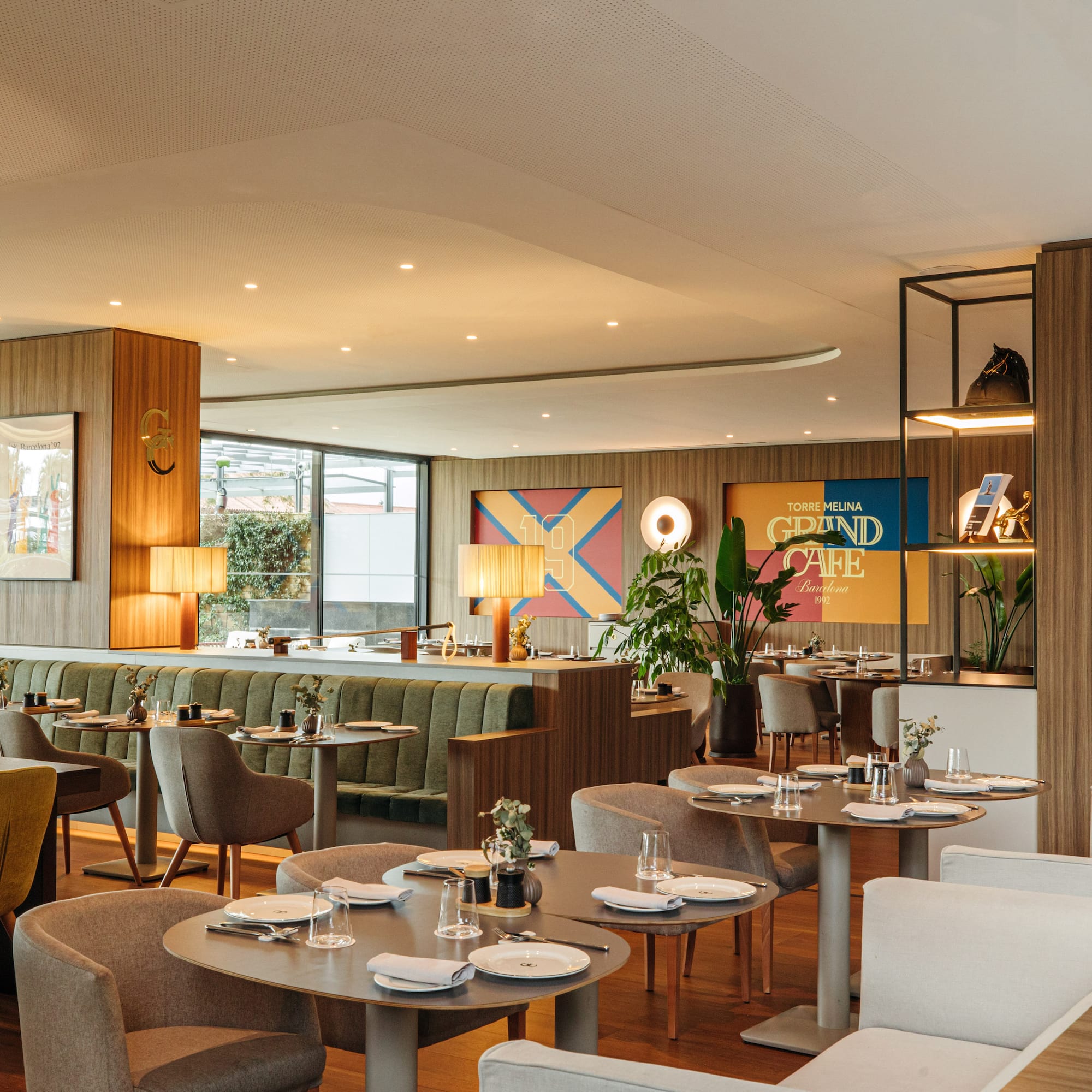 a restaurant with tables and chairs