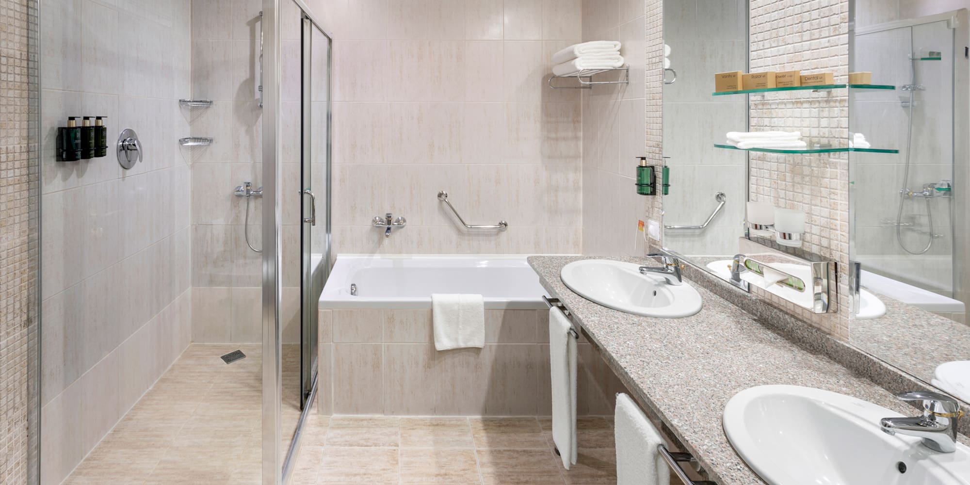 a bathroom with a shower and sink