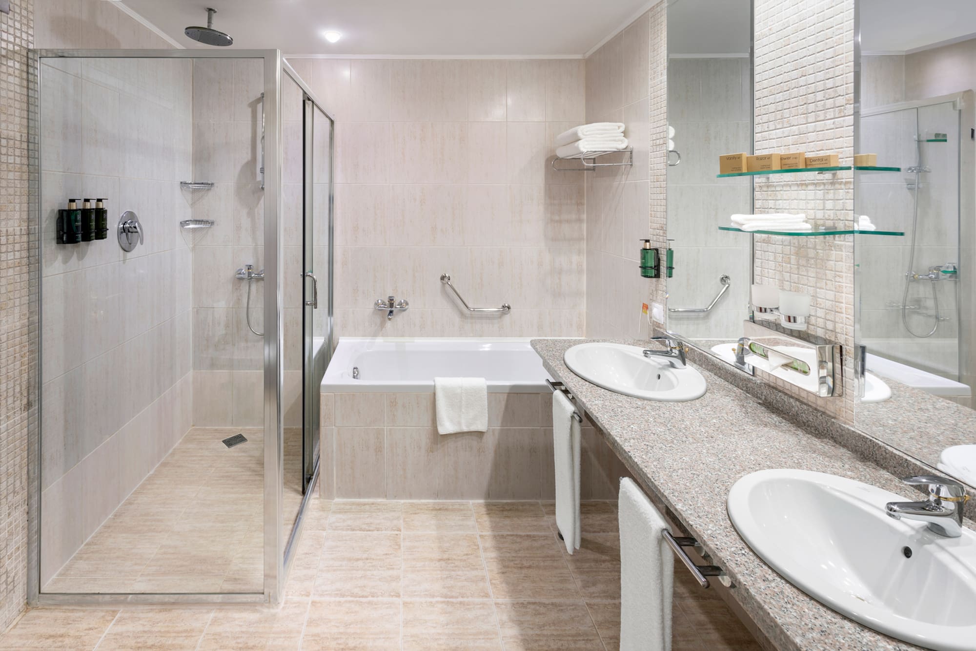 a bathroom with a shower and sink