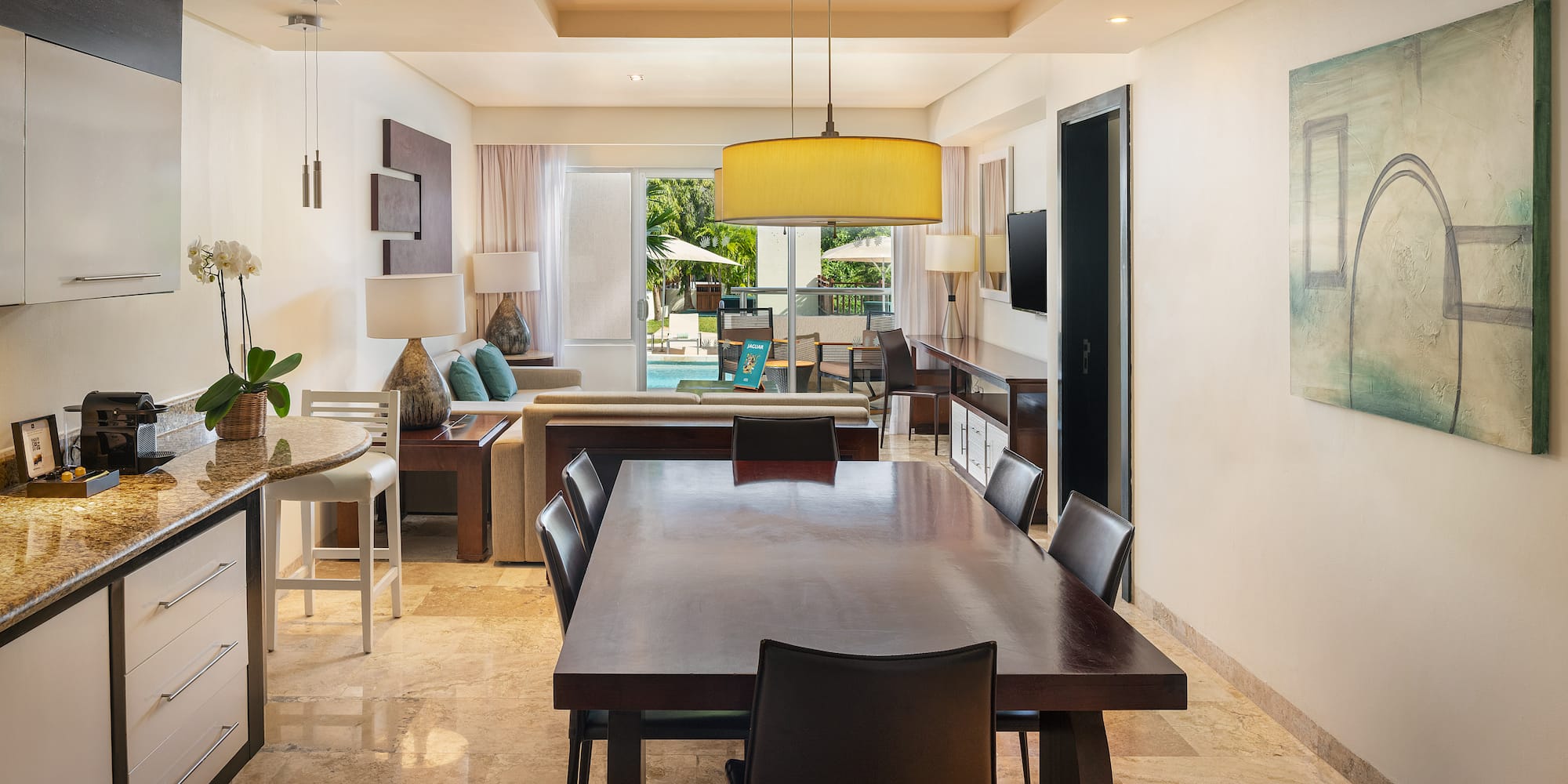 a room with a table and chairs