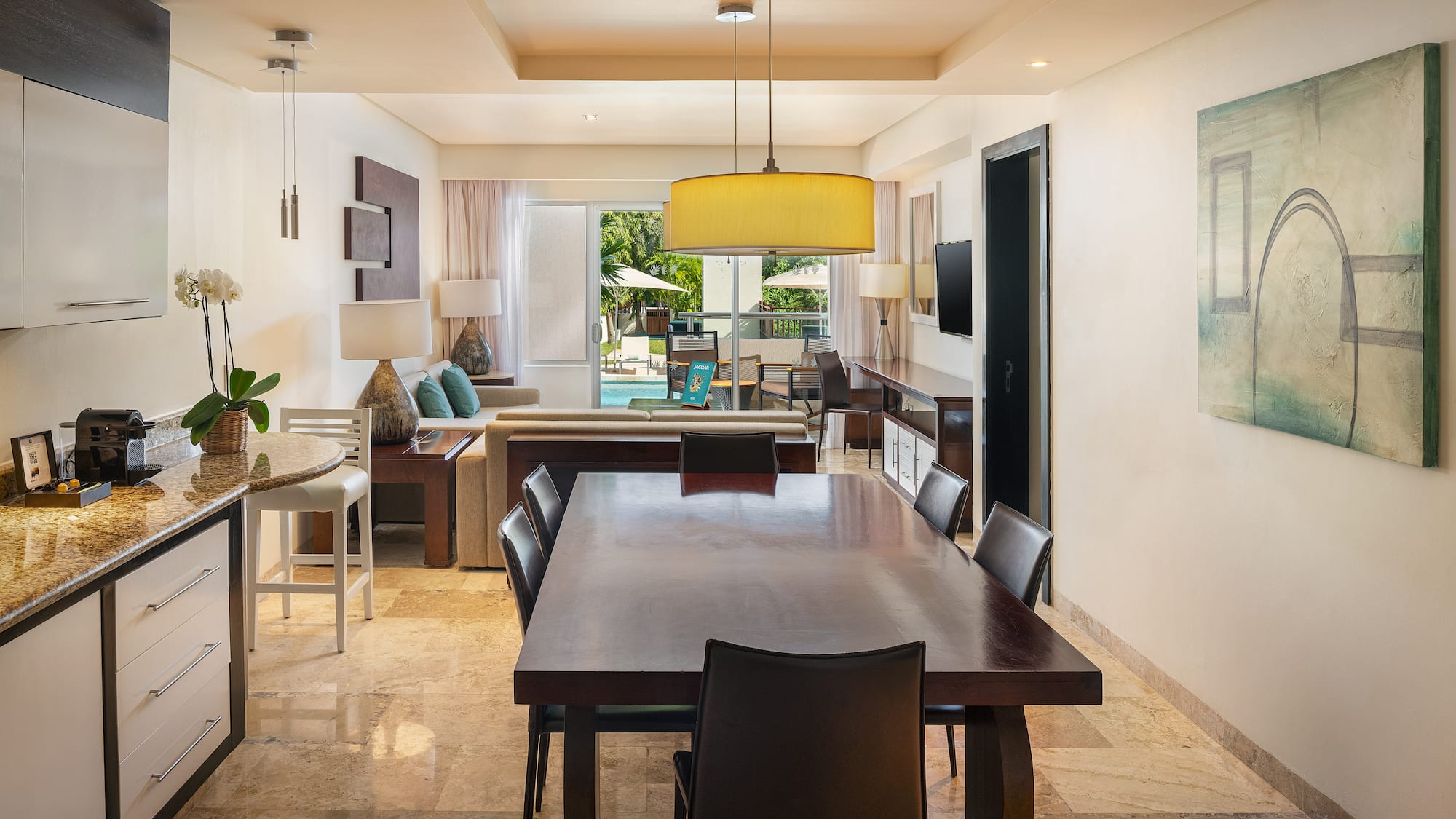 a room with a table and chairs