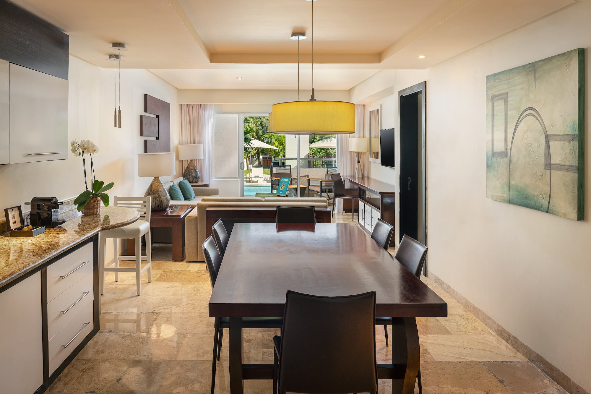 a room with a table and chairs