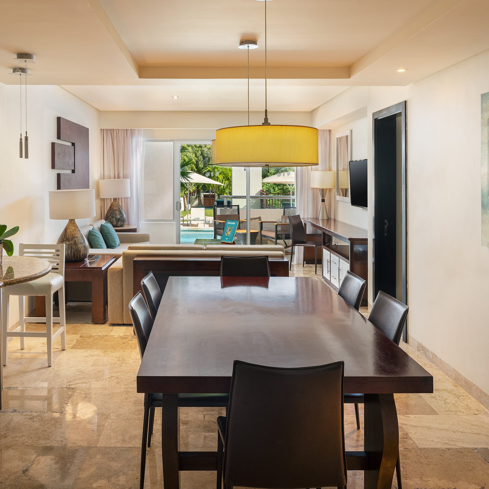 a room with a table and chairs