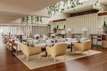 a room with chairs and tables