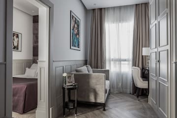 a room with a couch and a piano