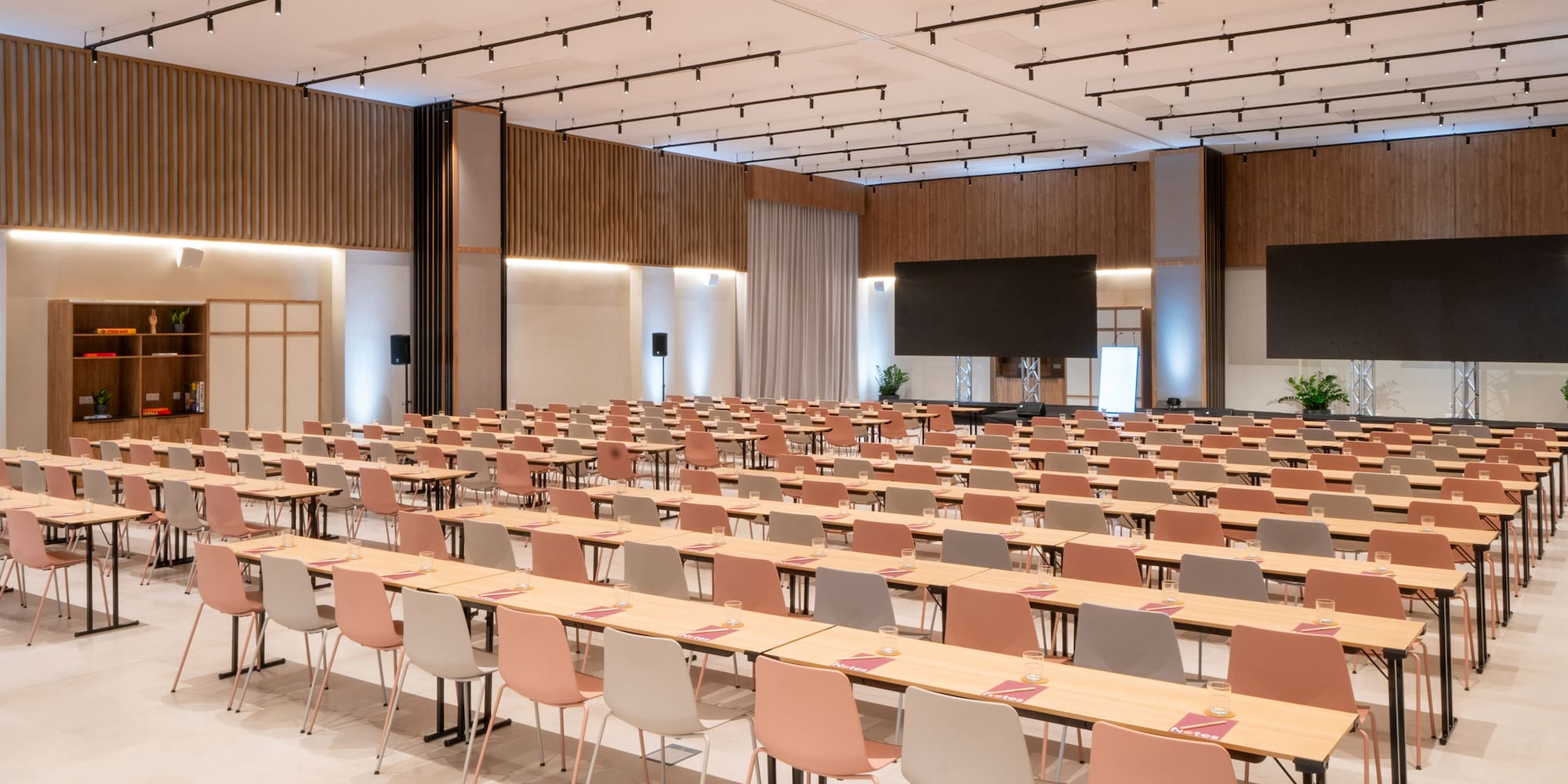 a ceiling with lights and a grey background