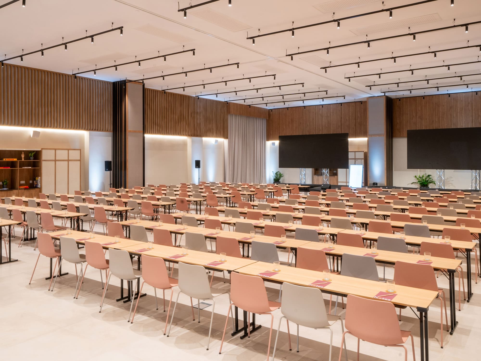 a ceiling with lights and a grey background