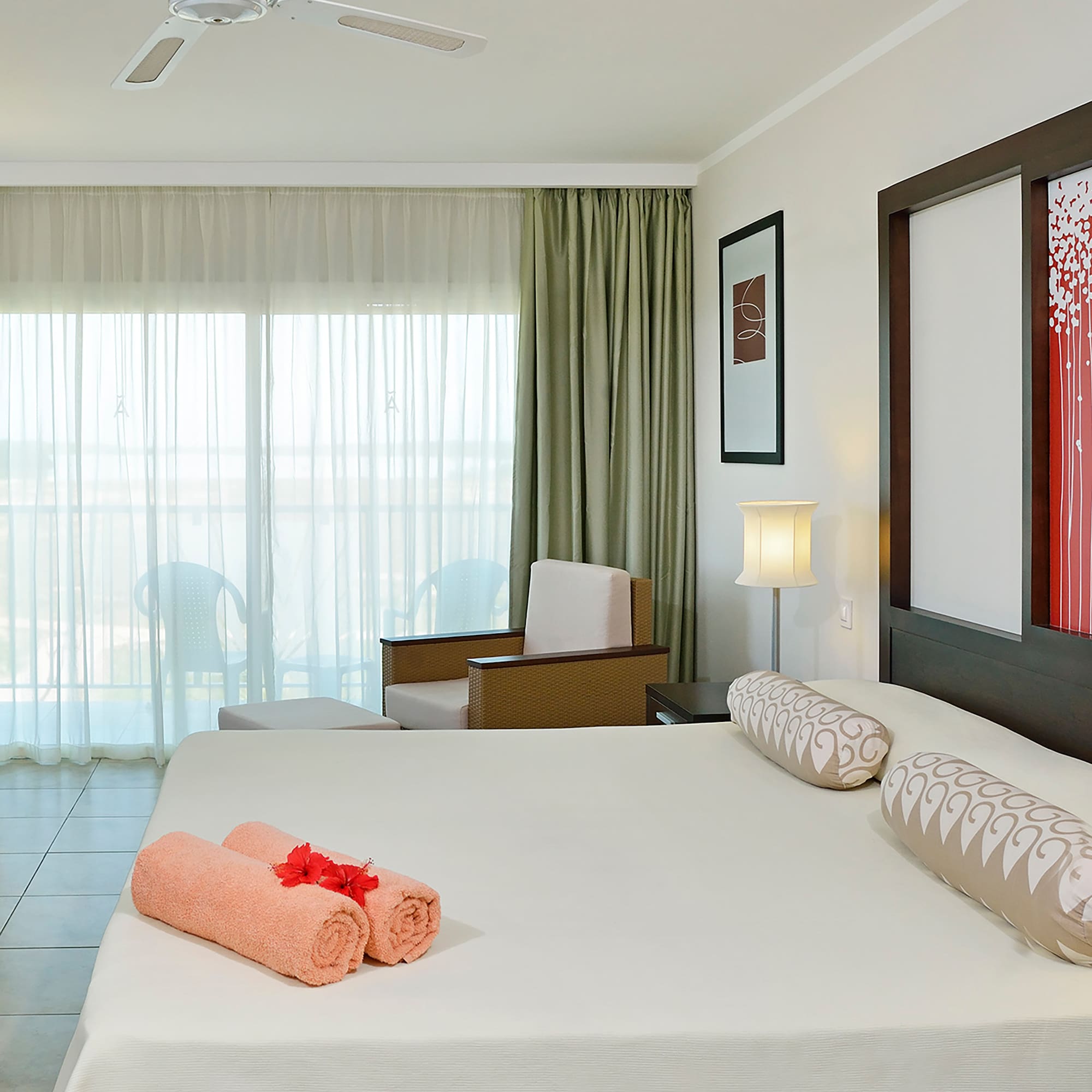 a bed with towels on it