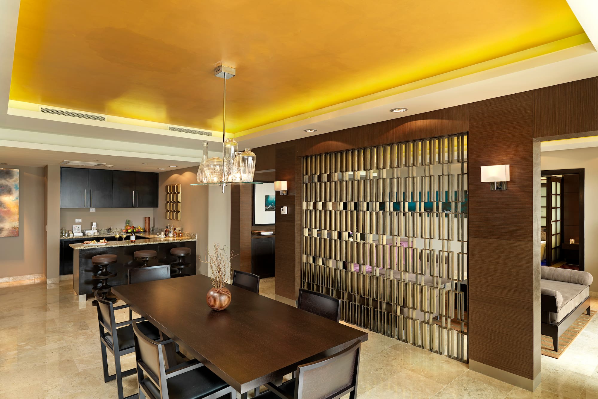 a dining room with a table and chairs