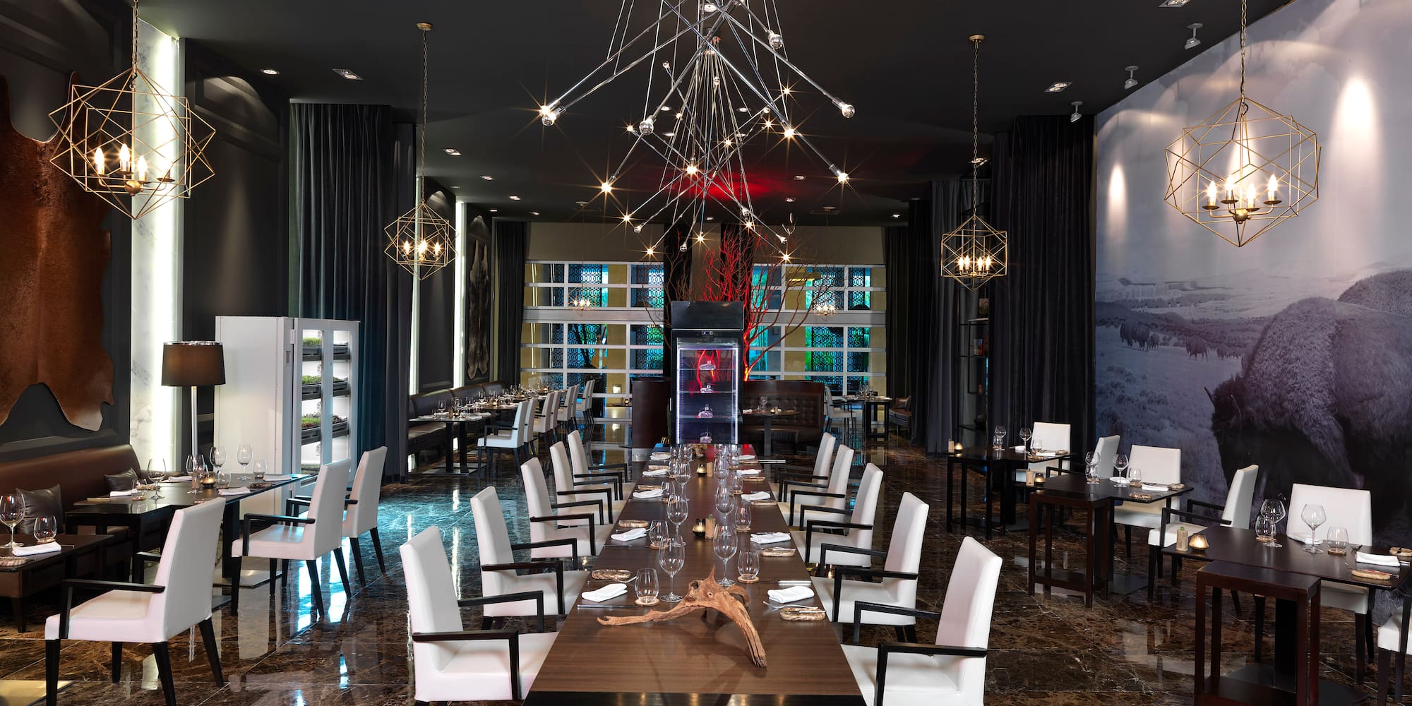 a room with a table and chairs