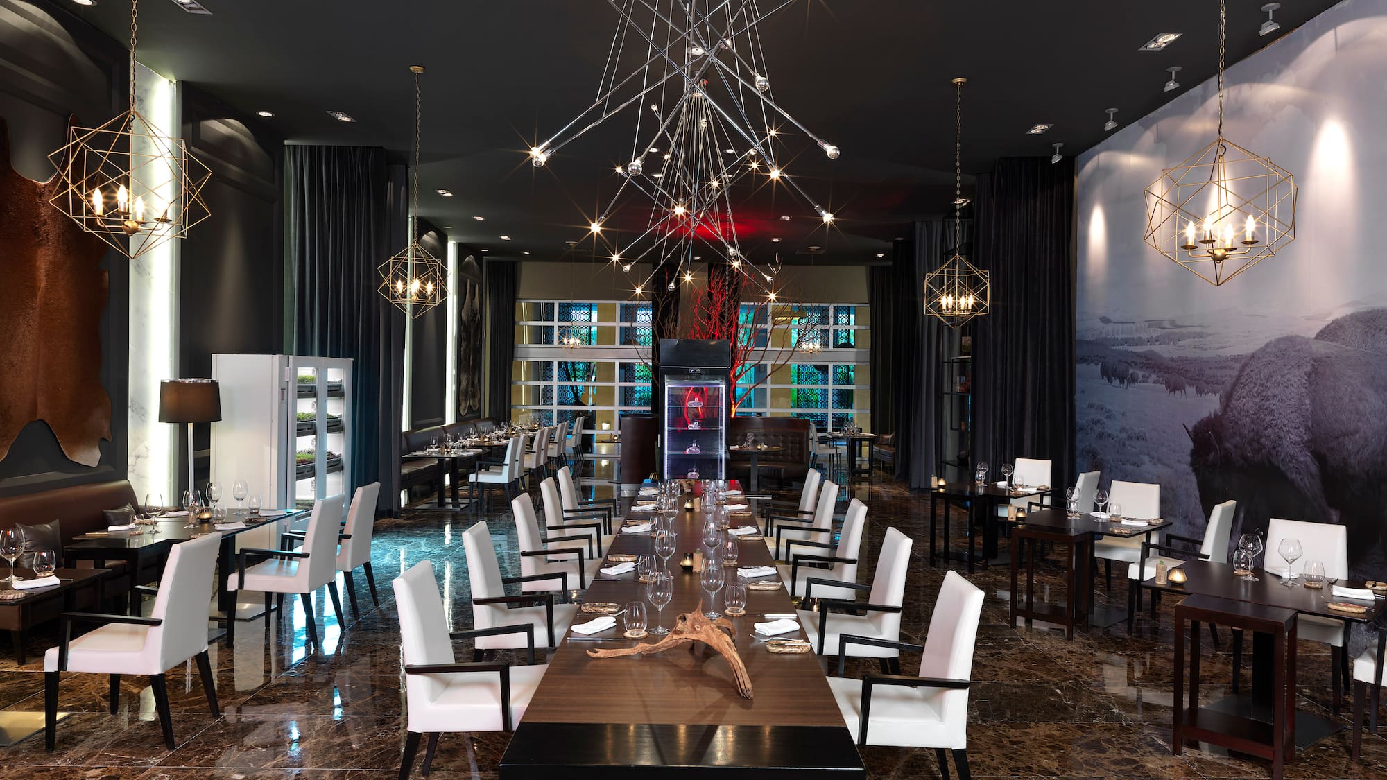 a room with a table and chairs