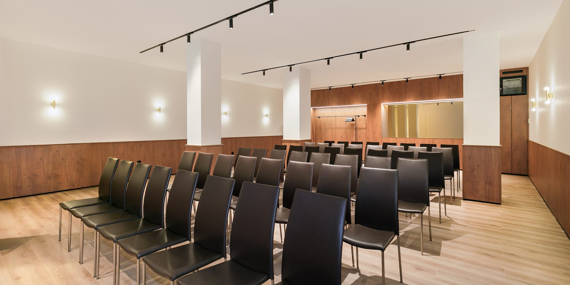 a room with rows of chairs
