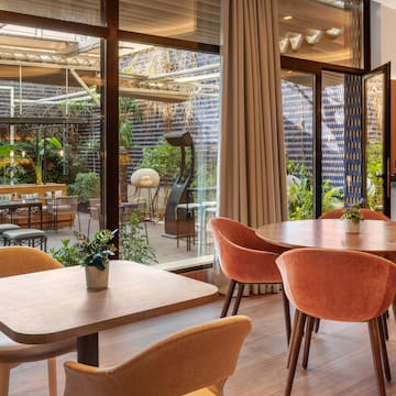 a room with tables and chairs