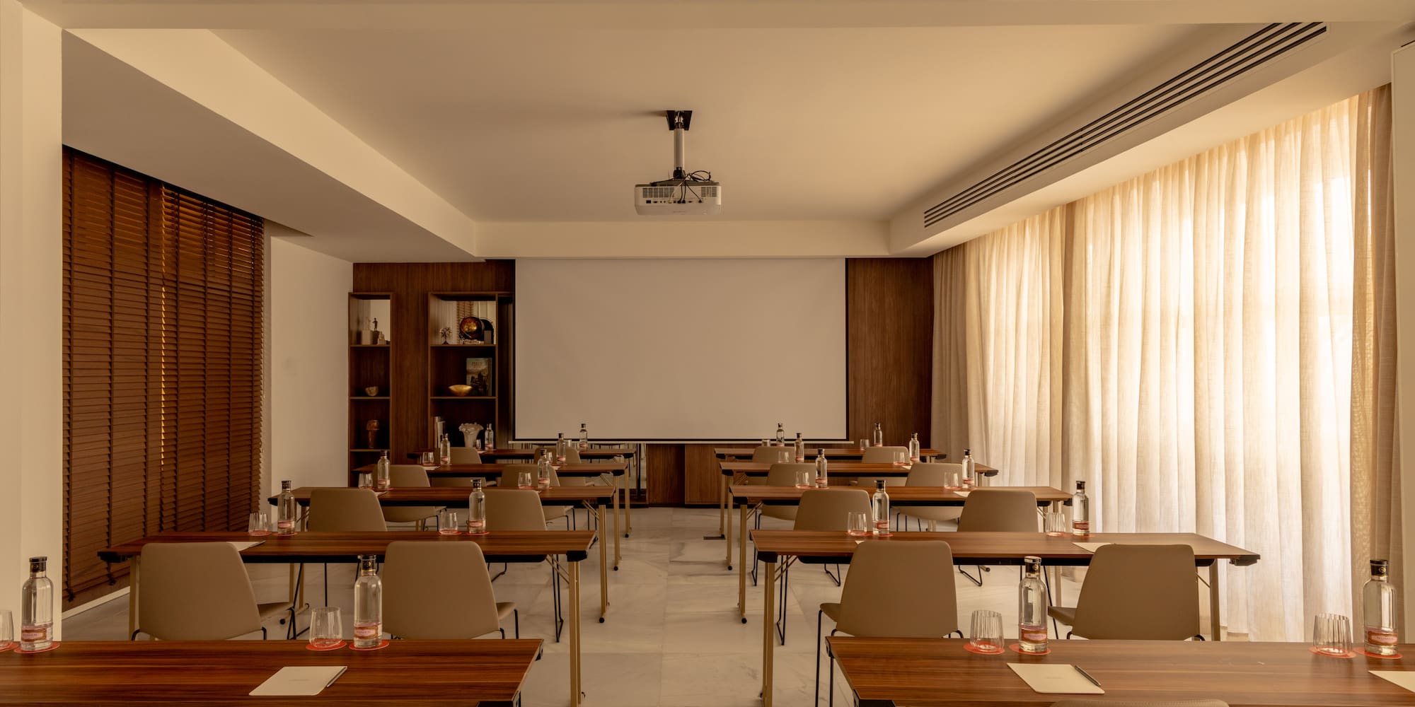 a room with tables and chairs