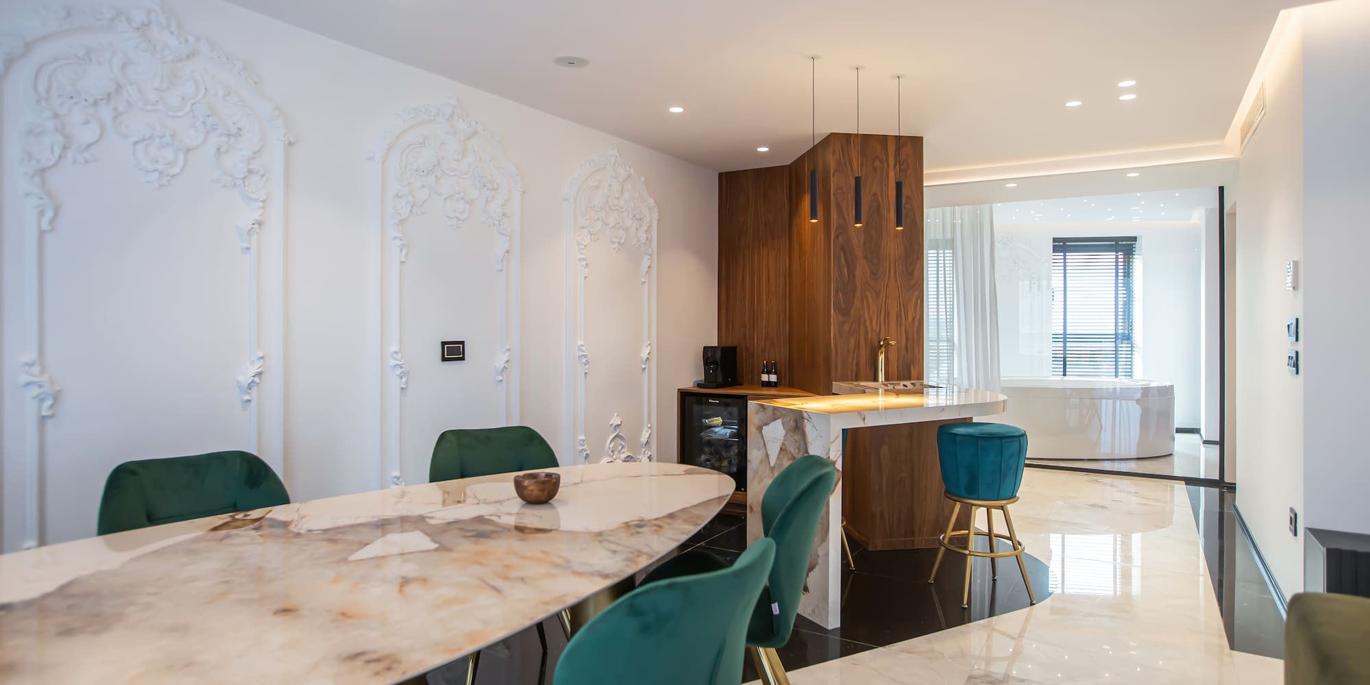 a dining room with a marble table and chairs