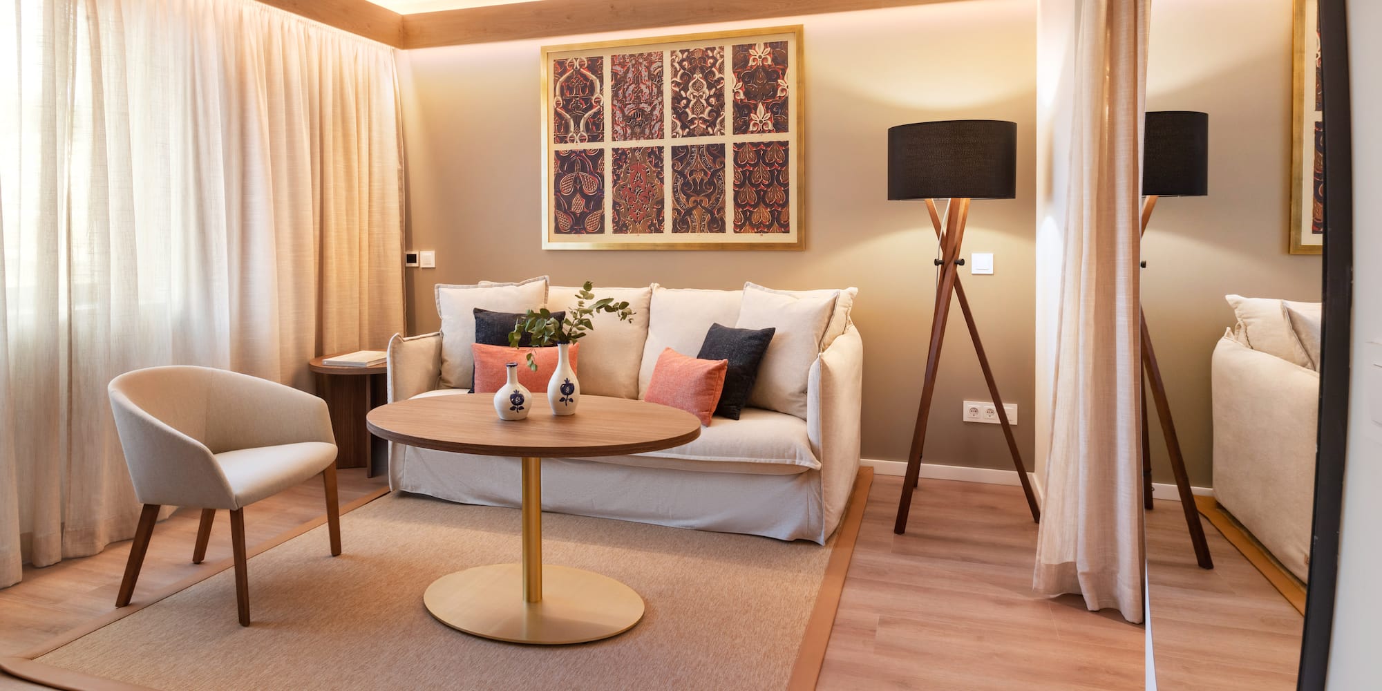 a living room with a couch and a table