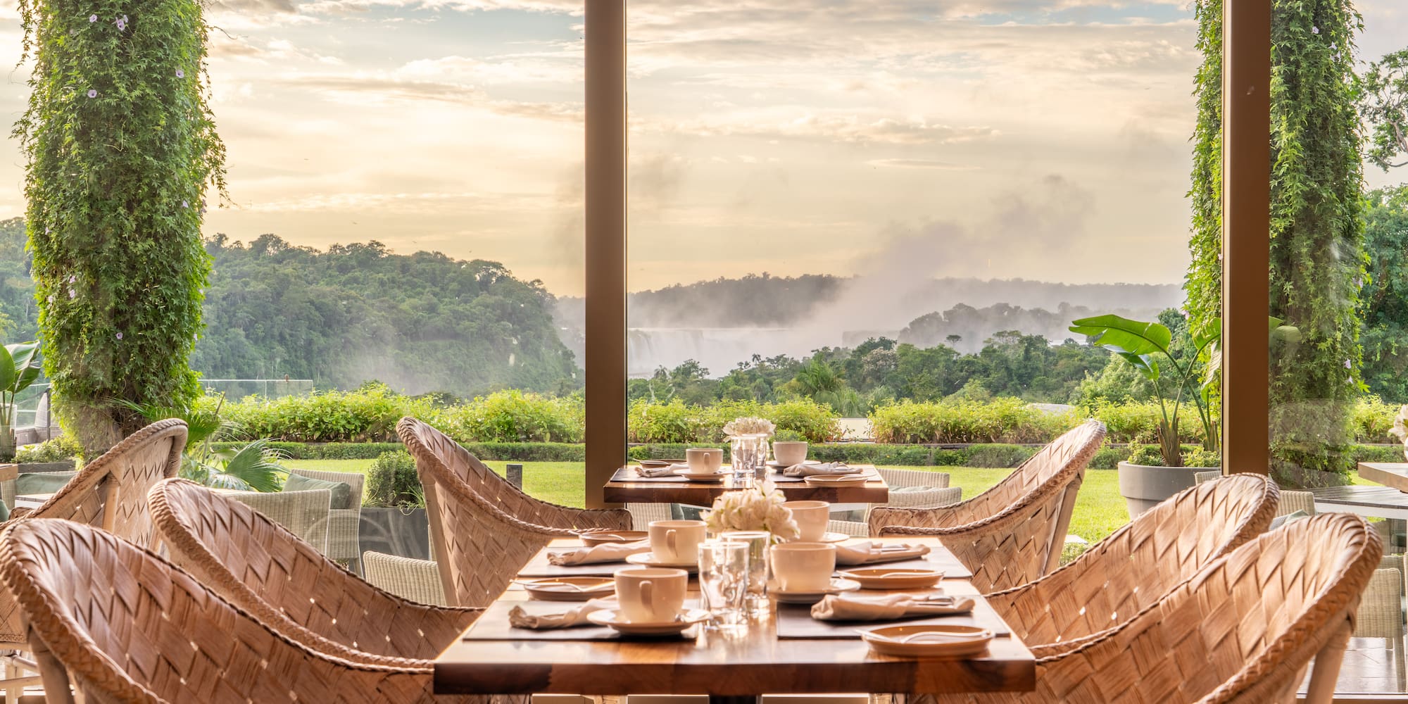 a table with chairs and plates on it
