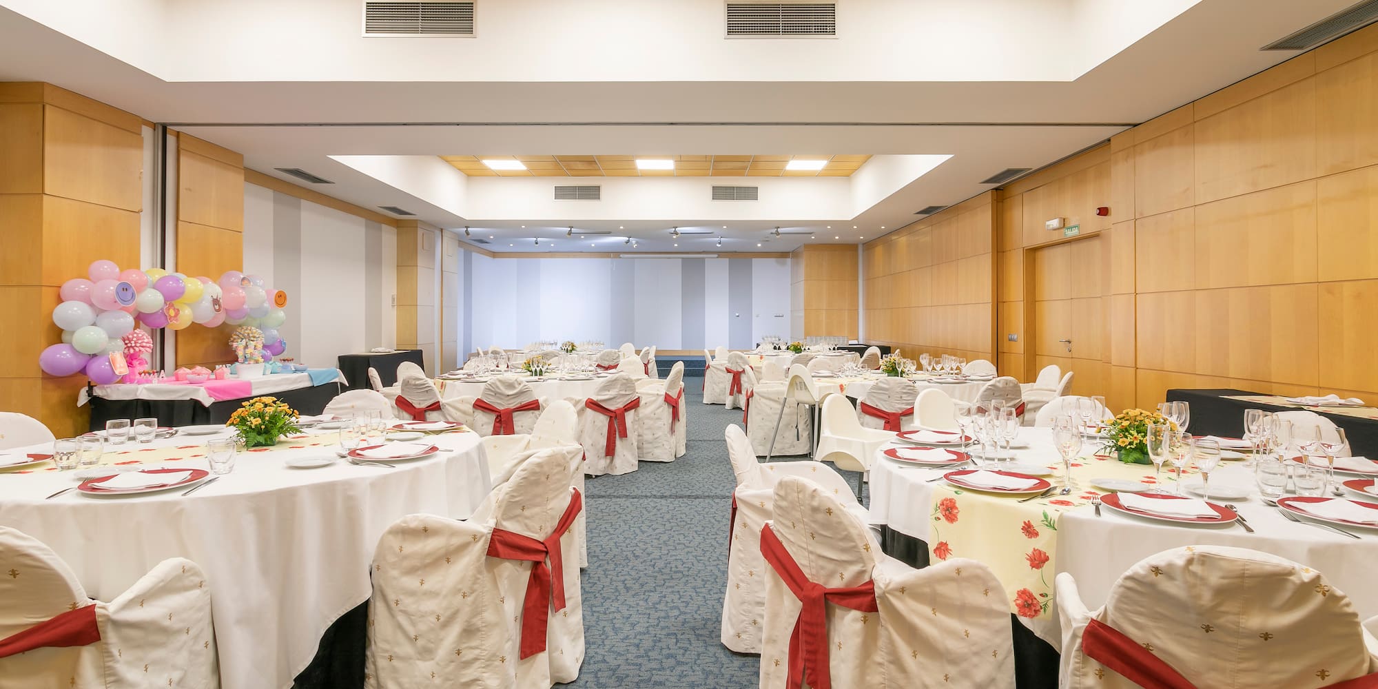 a room with tables and chairs