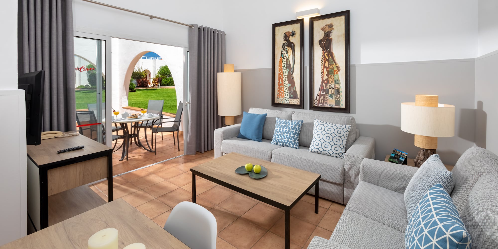 a living room with a couch and table