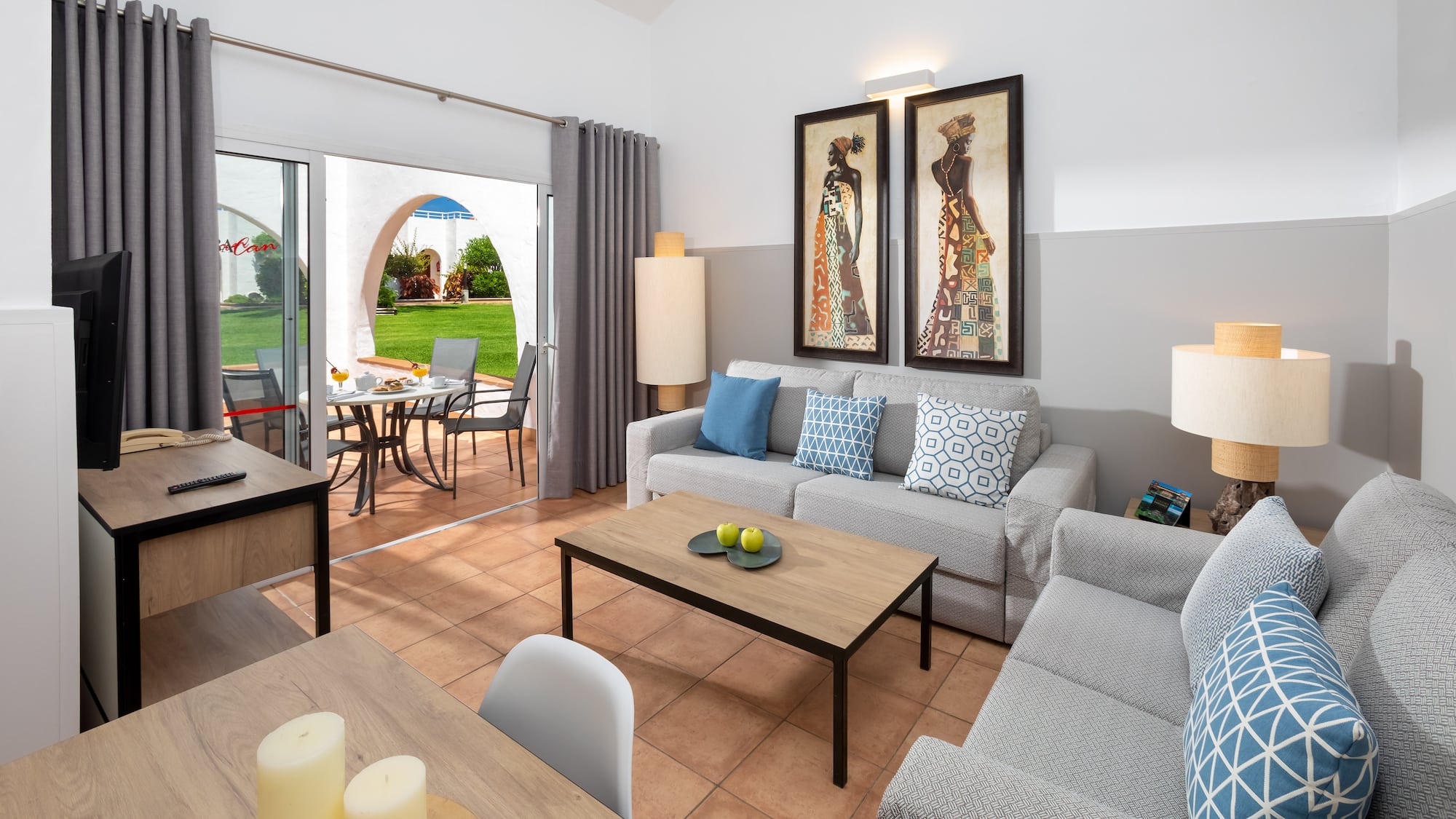 a living room with a couch and table