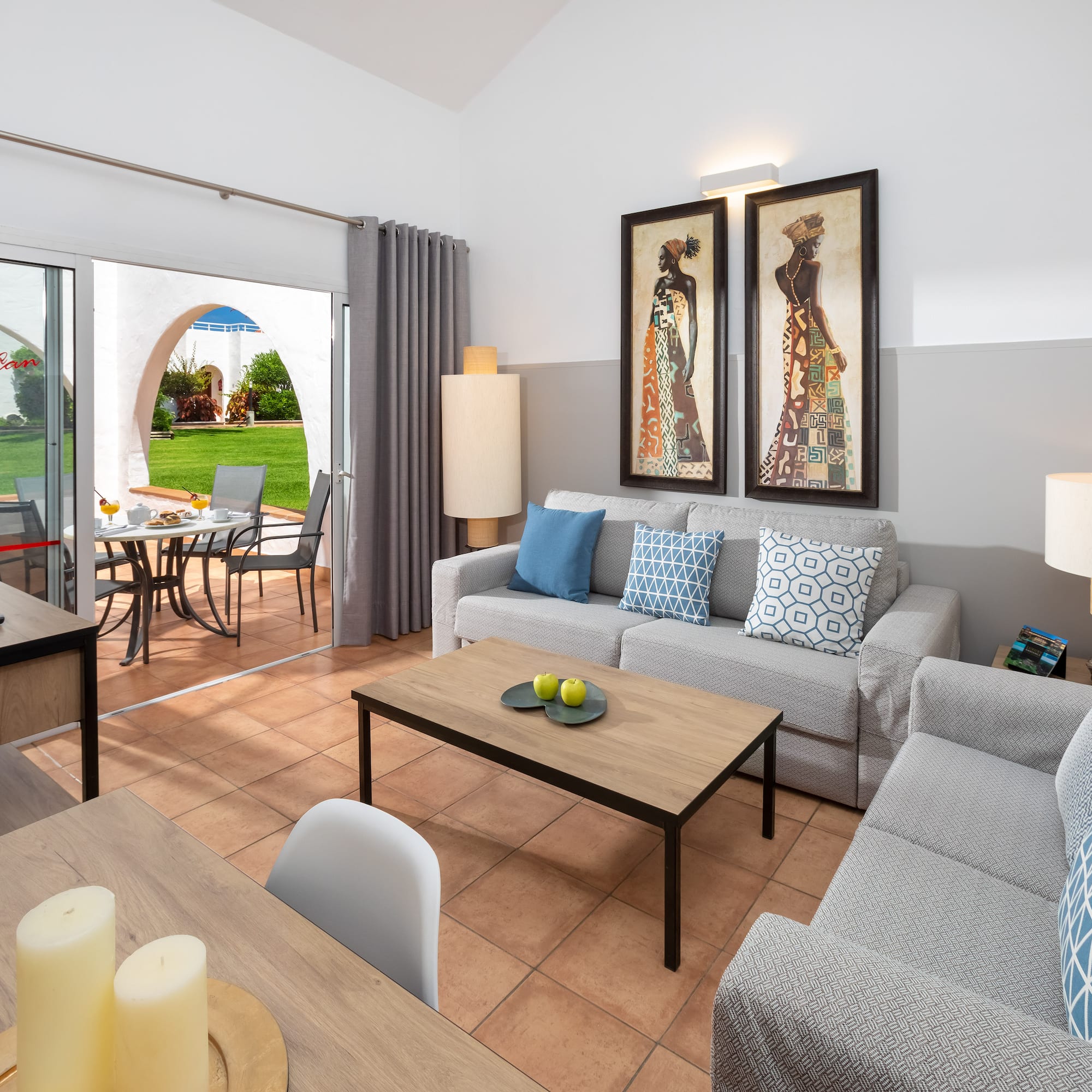 a living room with a couch and table