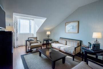 a room with a couch and a coffee table