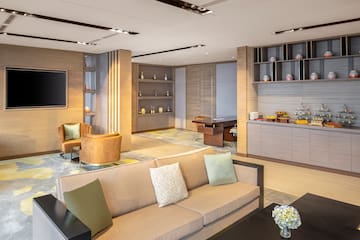 a living room with a couch and a table