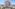 Melia oceanfront resort, modern building, grand entrance, lush palm trees.