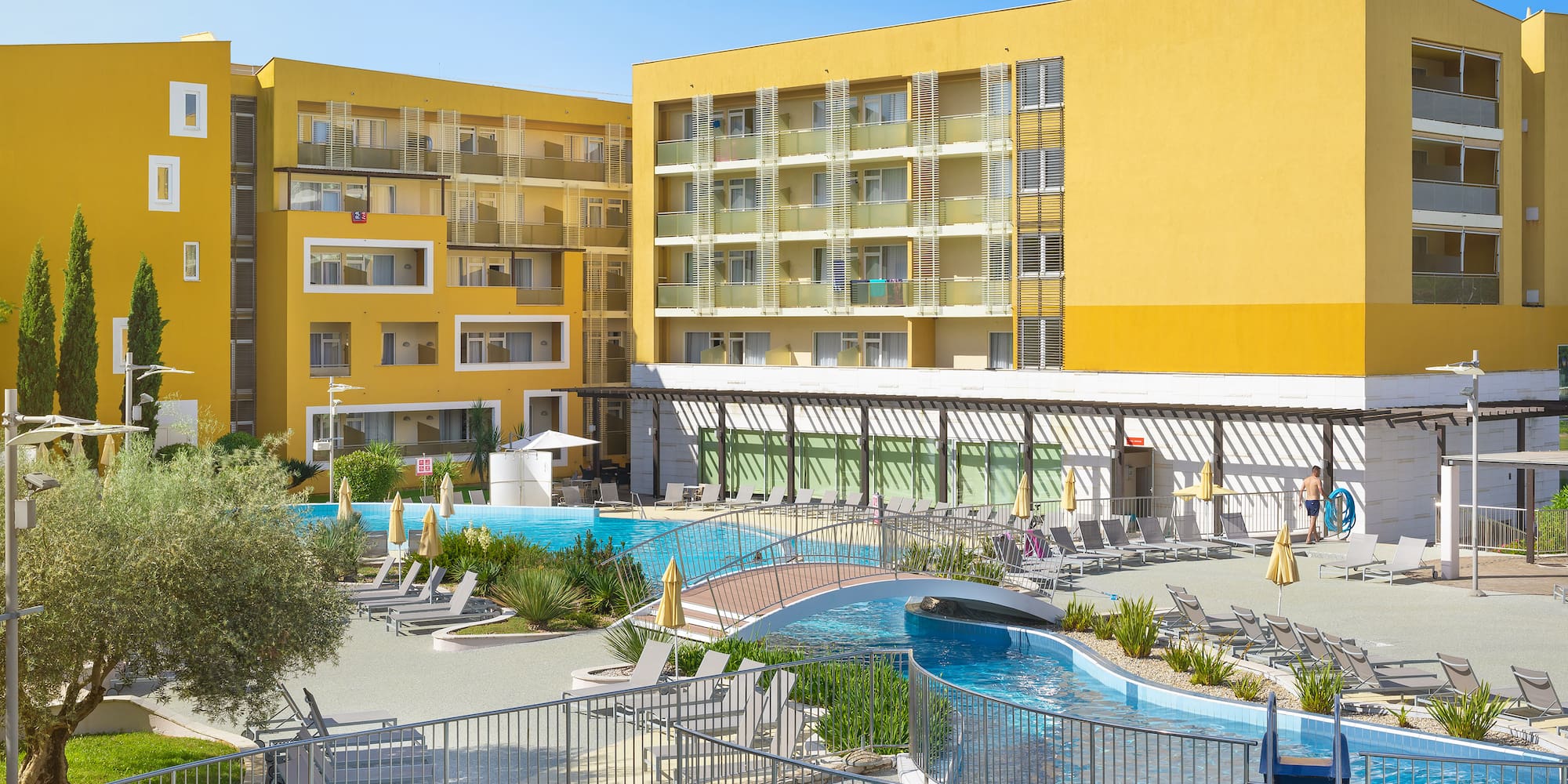 a pool in front of a building