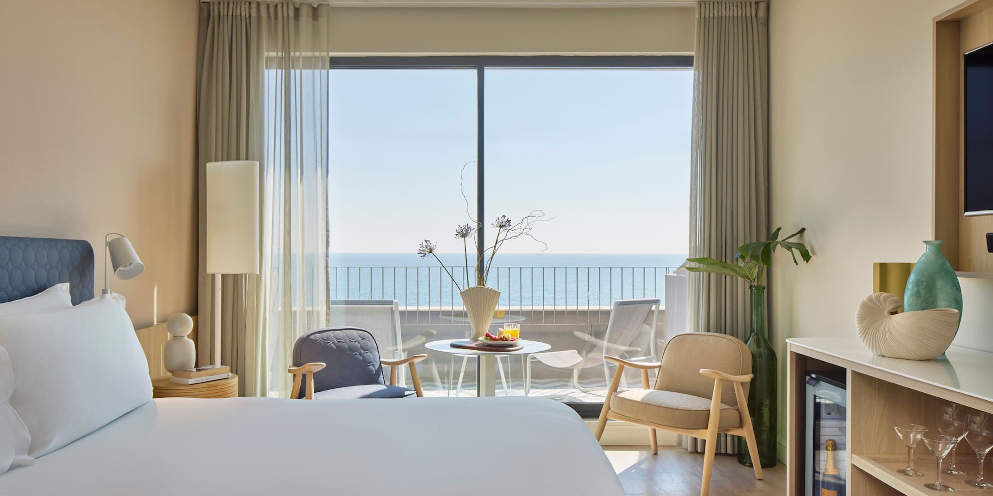 a room with a television and a bed