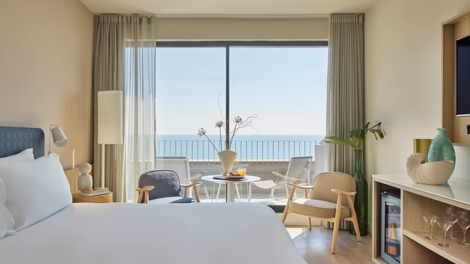 a room with a television and a bed